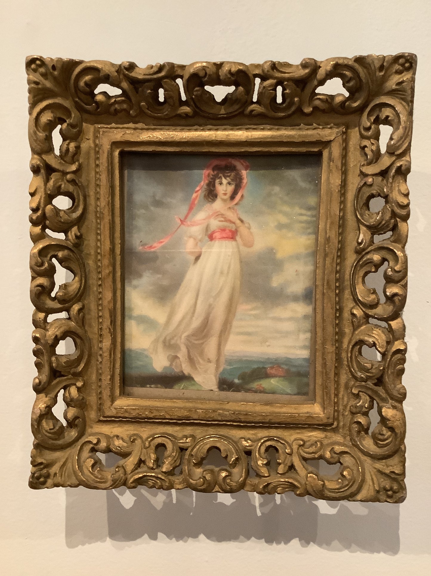 Gold framed “Girl in white dress”
