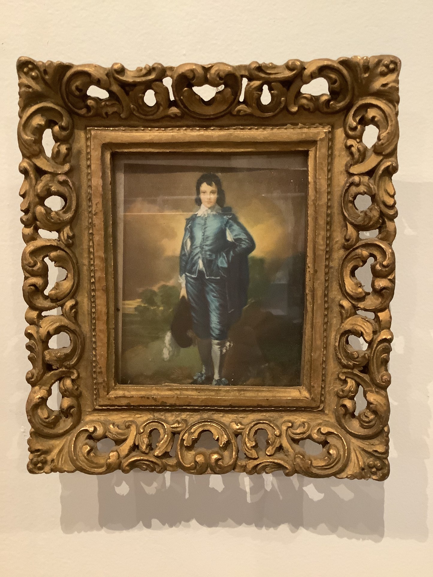 Gold framed “Boy in blue”